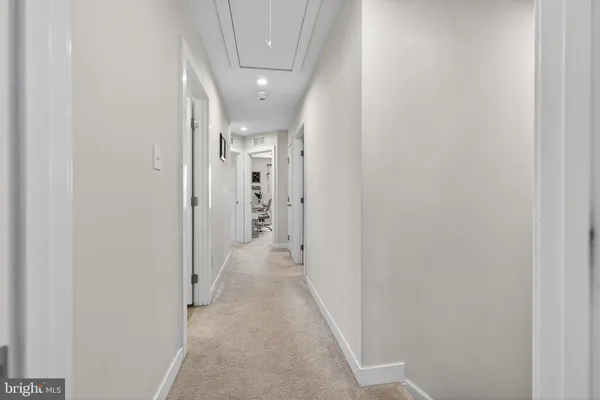 a bed room with a bed and a ceiling fan