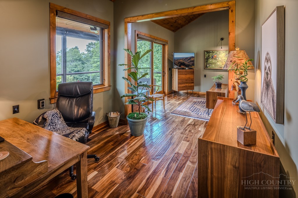 179 Adams Road Vilas, NC 28692 - Photo 16 of 50 a view of a livingroom with furniture hardwood floor and windows