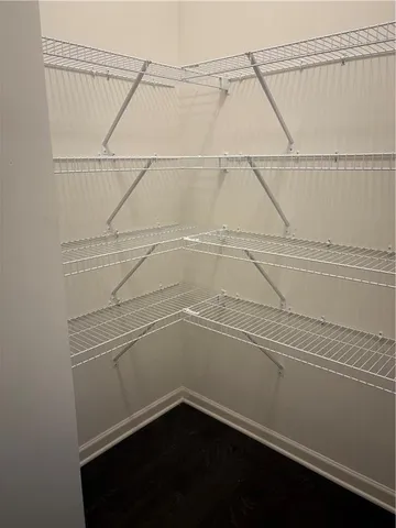 a view of an empty walk in closet