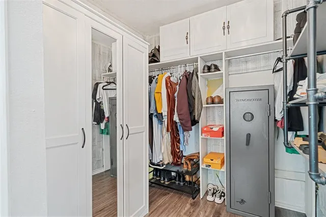 a bedroom with a workspace