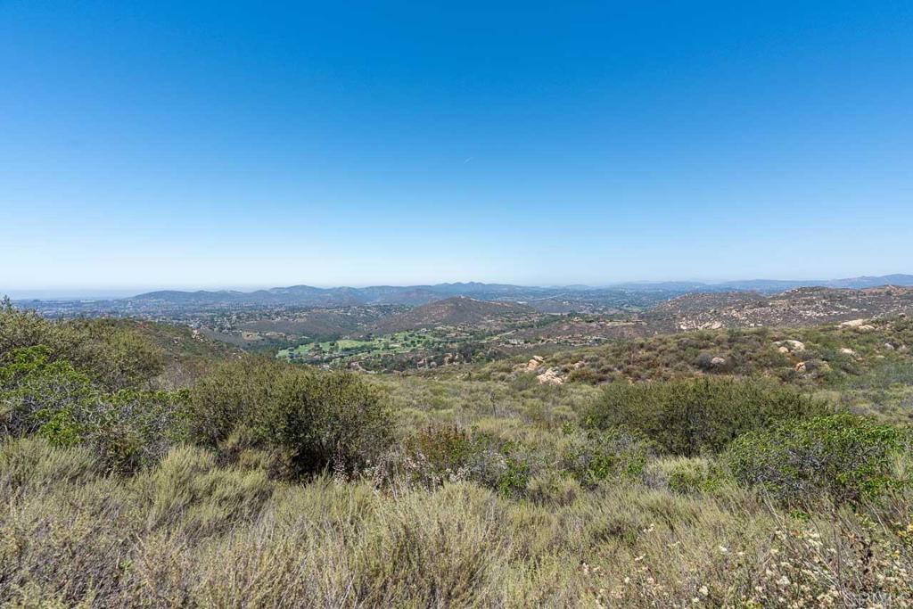 18055 Sunset Point Poway, CA 92064 - Photo 25 of 39 a view of a city with lush green forest