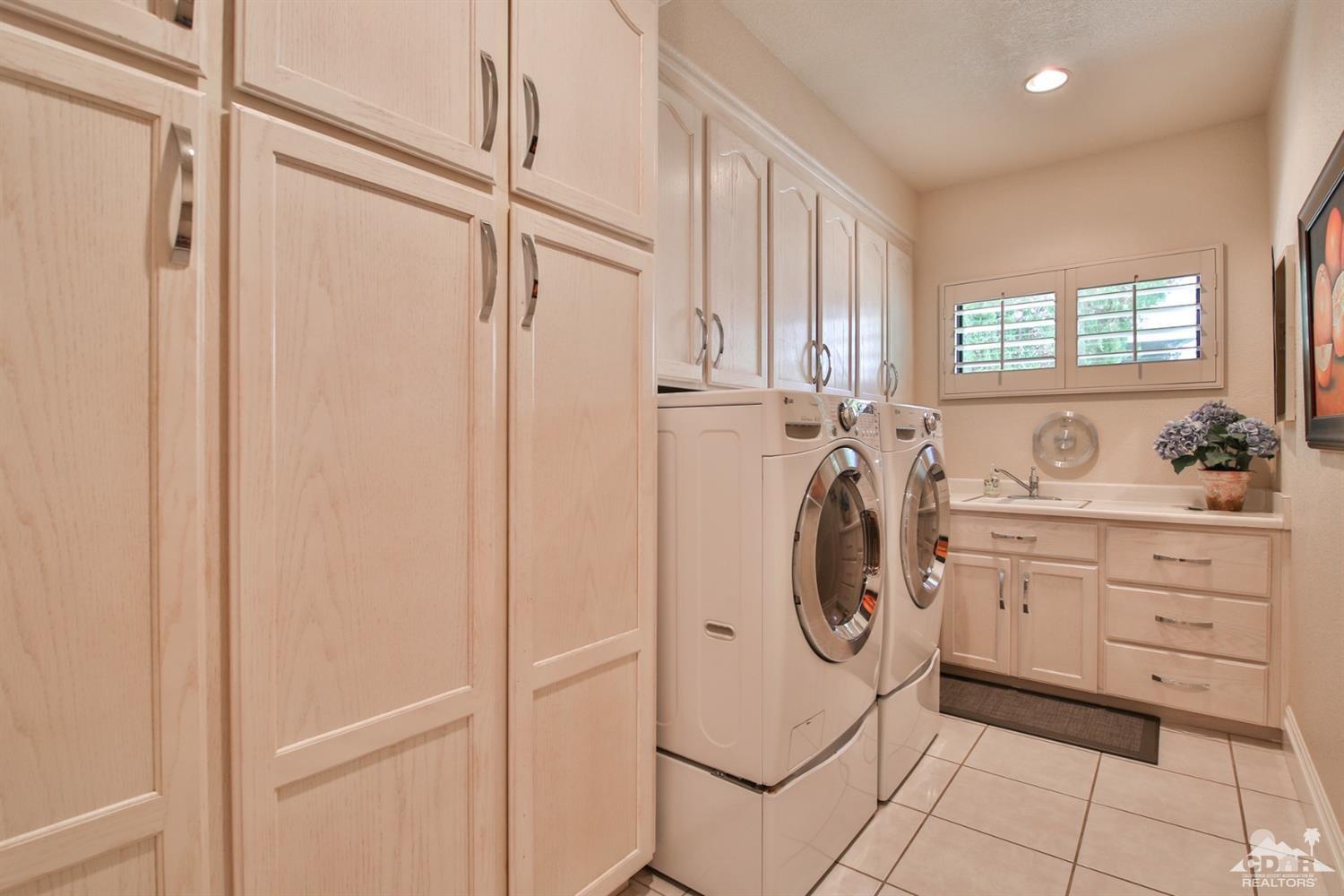 70689 Boothill Road Rancho Mirage, CA 92270 - Photo 12 of 45 a view of bathroom with washer and dryer