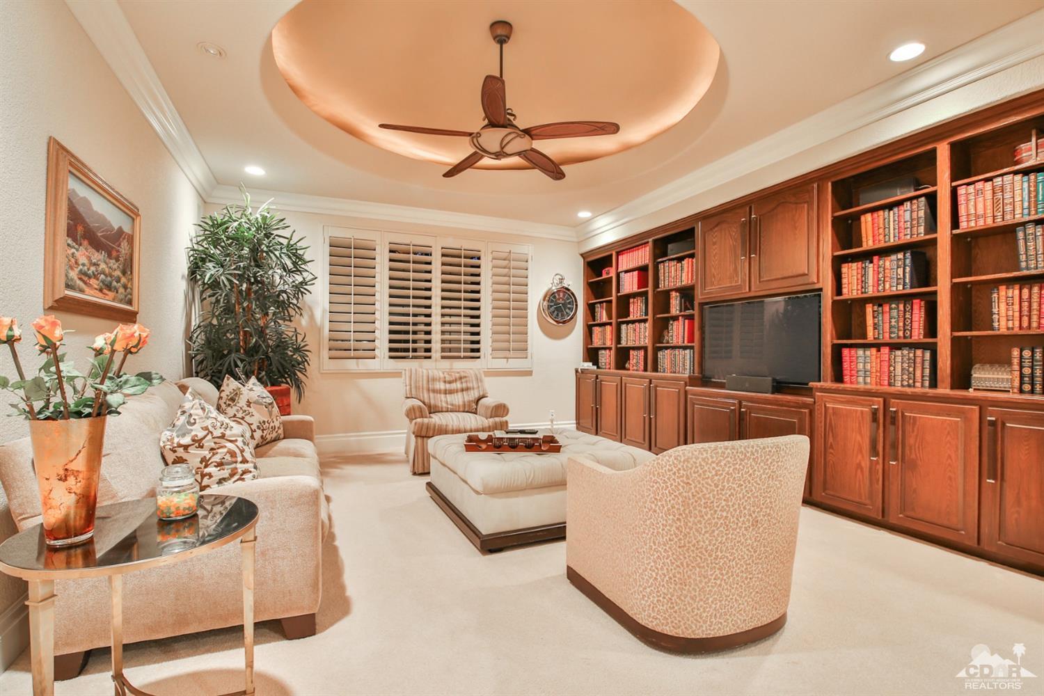 70689 Boothill Road Rancho Mirage, CA 92270 - Photo 17 of 45 a living room with furniture and a large window