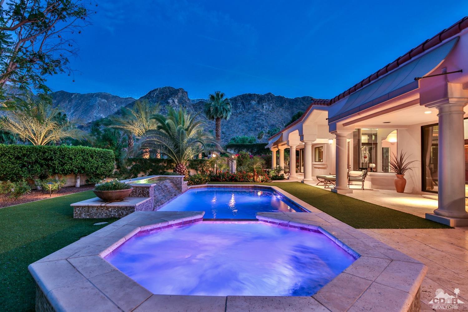 70689 Boothill Road Rancho Mirage, CA 92270 - Photo 2 of 45 a view of a swimming pool with sitting area