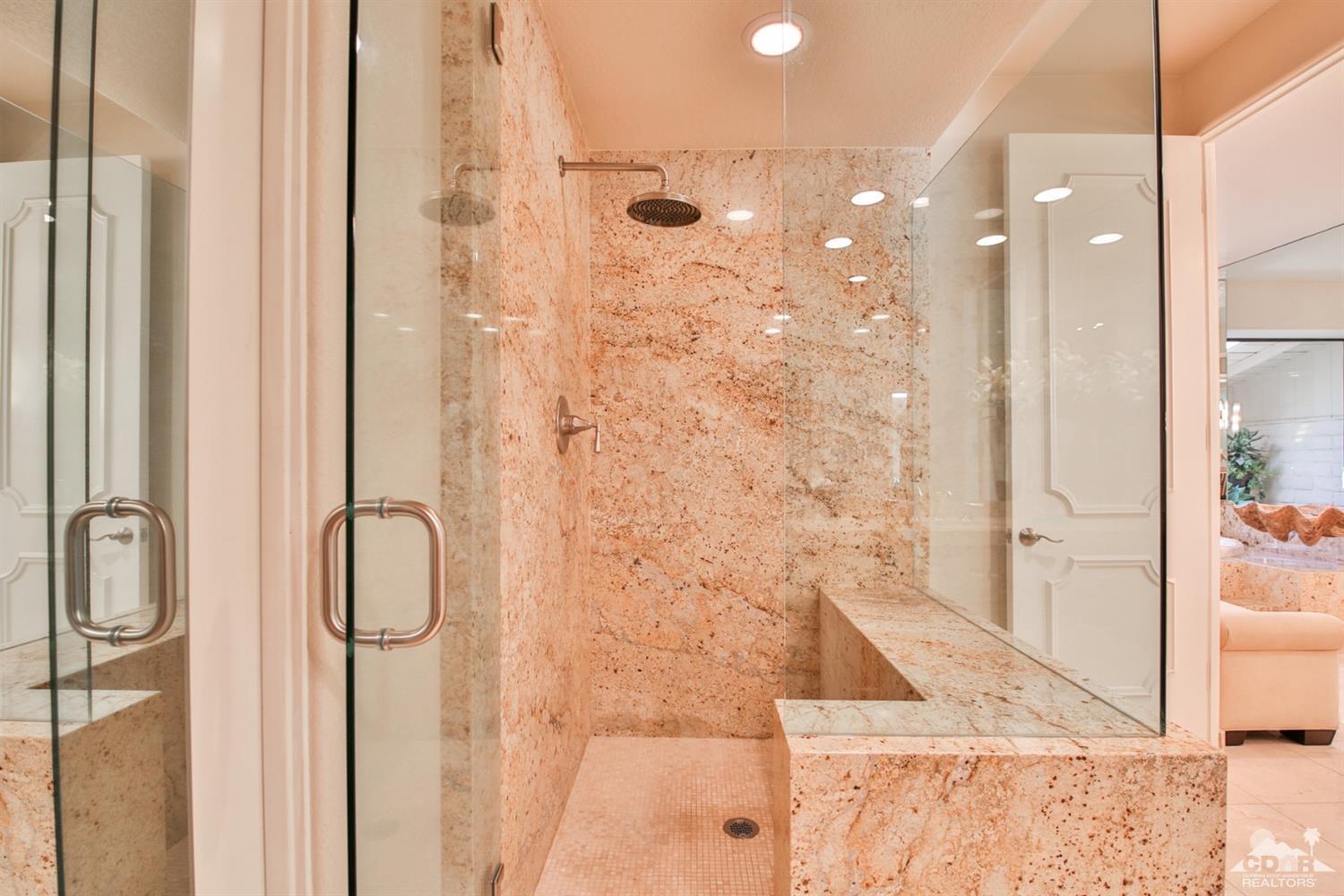 70689 Boothill Road Rancho Mirage, CA 92270 - Photo 31 of 45 a bathroom with a shower