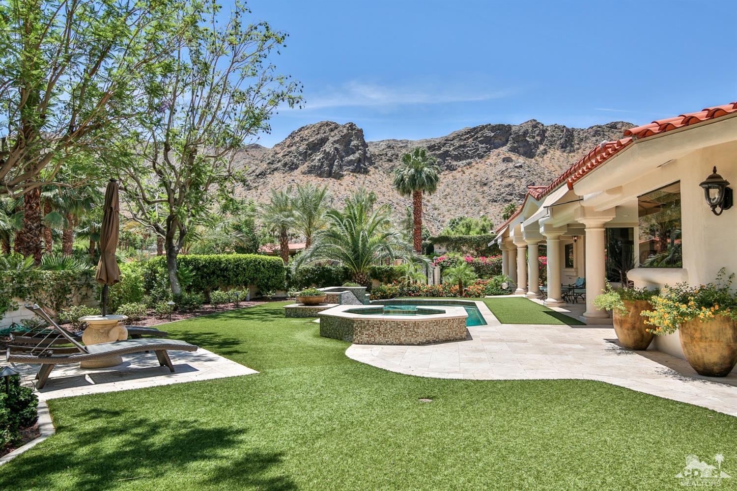70689 Boothill Road Rancho Mirage, CA 92270 - Photo 32 of 45 a view of a house with backyard and sitting area
