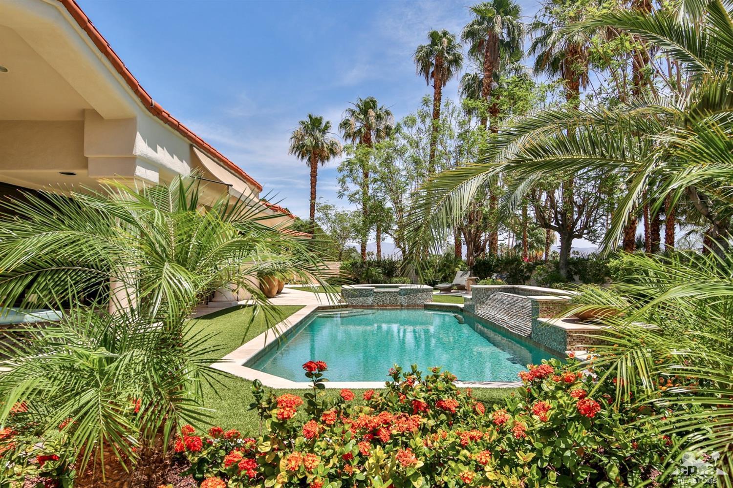 70689 Boothill Road Rancho Mirage, CA 92270 - Photo 34 of 45 a view of swimming pool with a garden and trees