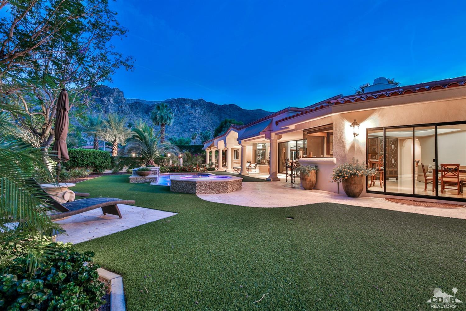 70689 Boothill Road Rancho Mirage, CA 92270 - Photo 37 of 45 a view of a house with backyard porch and garden