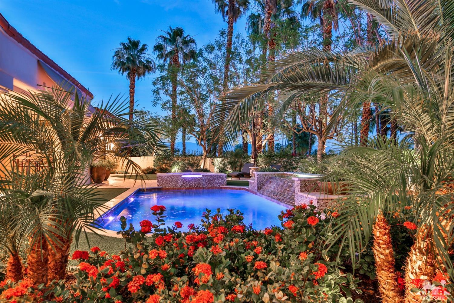 70689 Boothill Road Rancho Mirage, CA 92270 - Photo 44 of 45 a view of a swimming pool with an outdoor space and seating area