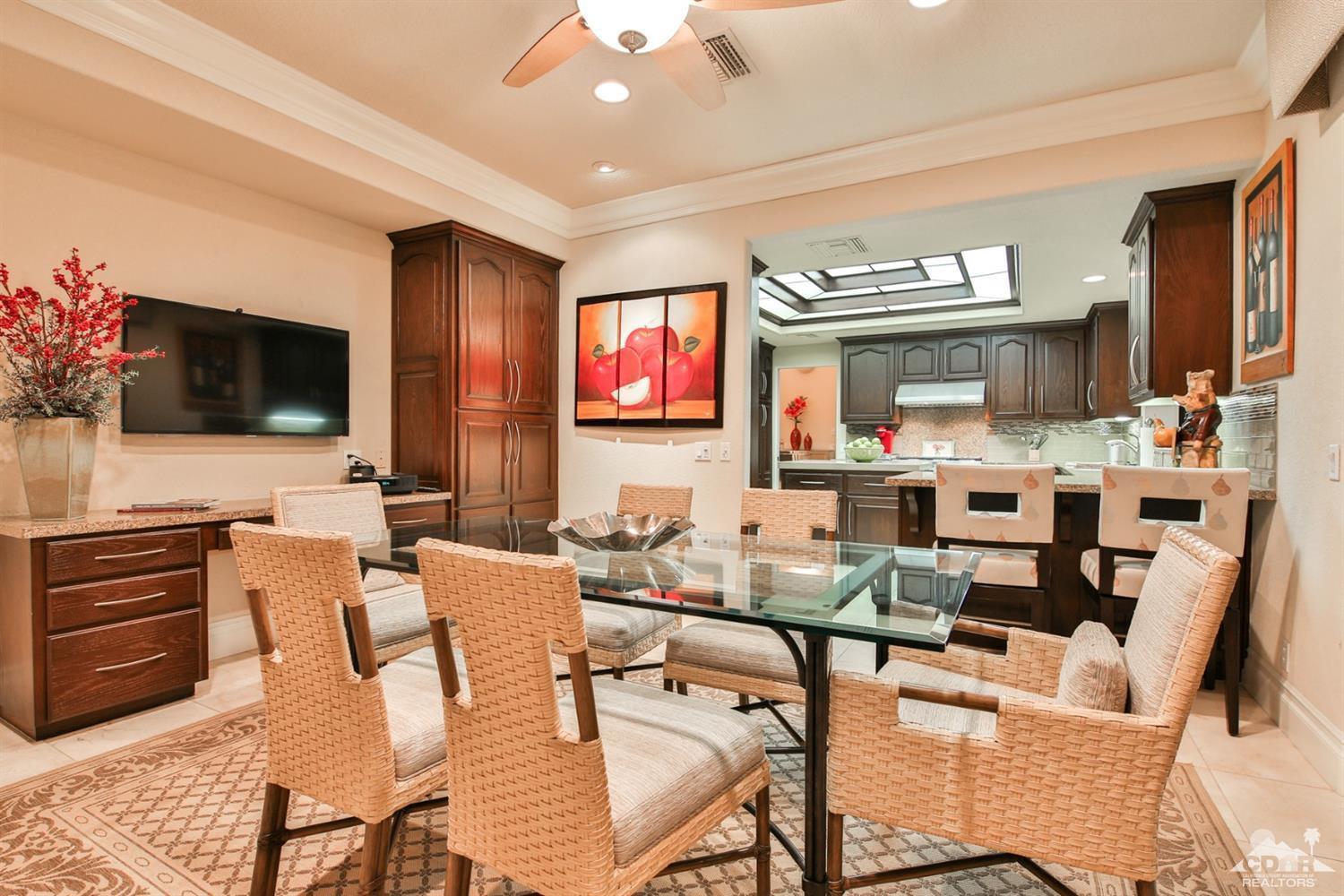 70689 Boothill Road Rancho Mirage, CA 92270 - Photo 7 of 45 a living room with furniture and a flat screen tv