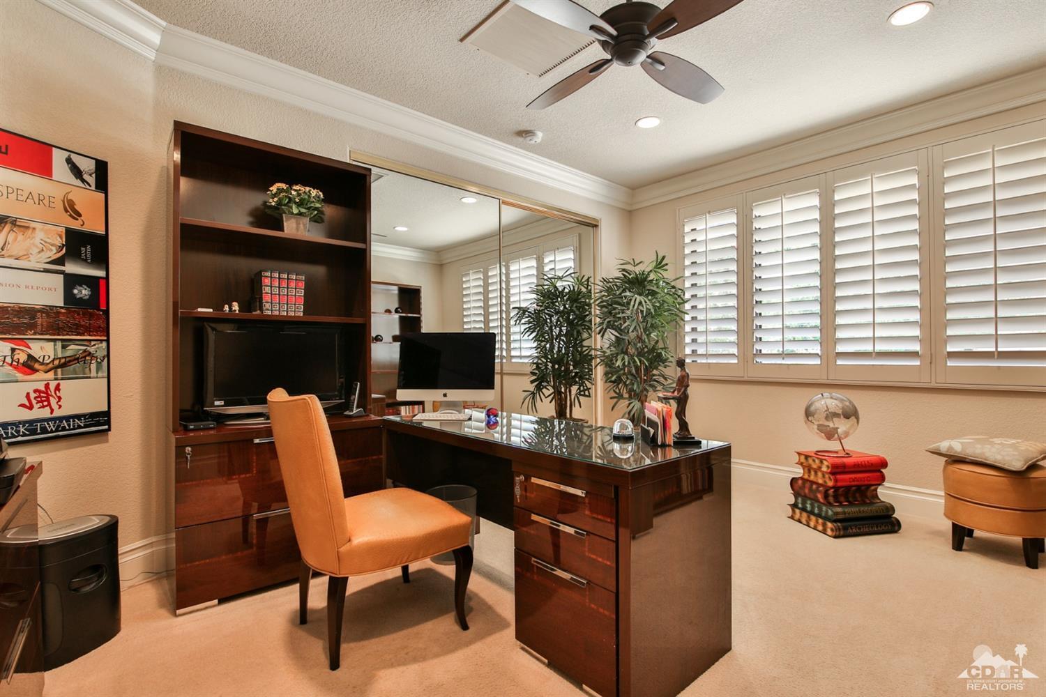 70689 Boothill Road Rancho Mirage, CA 92270 - Photo 9 of 45 a livingroom with furniture and a potted plant