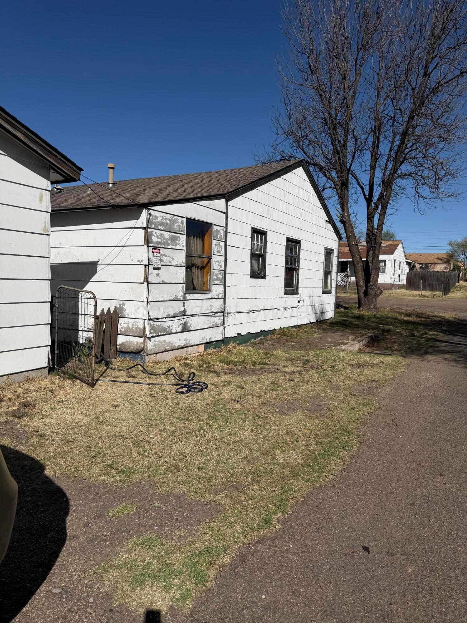 215 Hickory Street Borger, TX 79007 - Photo 18 of 18 a house view with a backyard space