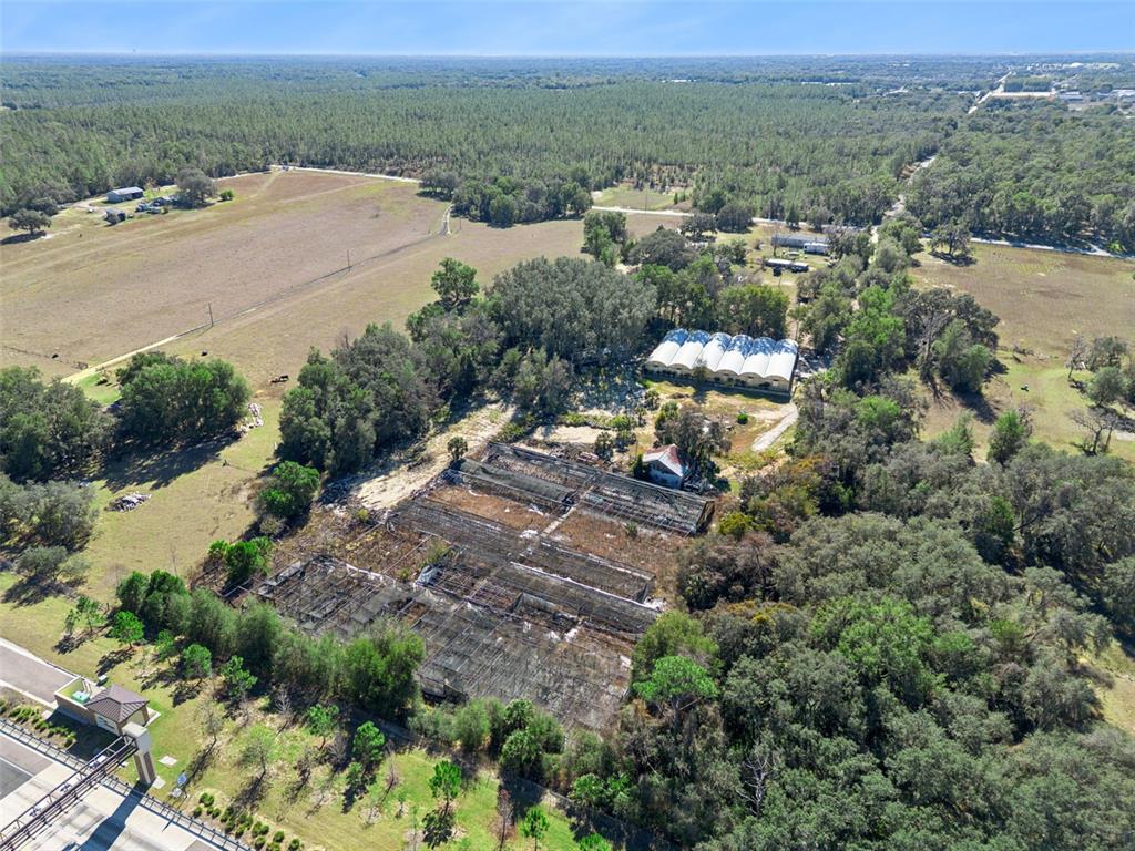 1909 Haas Road Apopka, FL 32712 - Photo 11 of 13 an aerial view of a houses with a yard