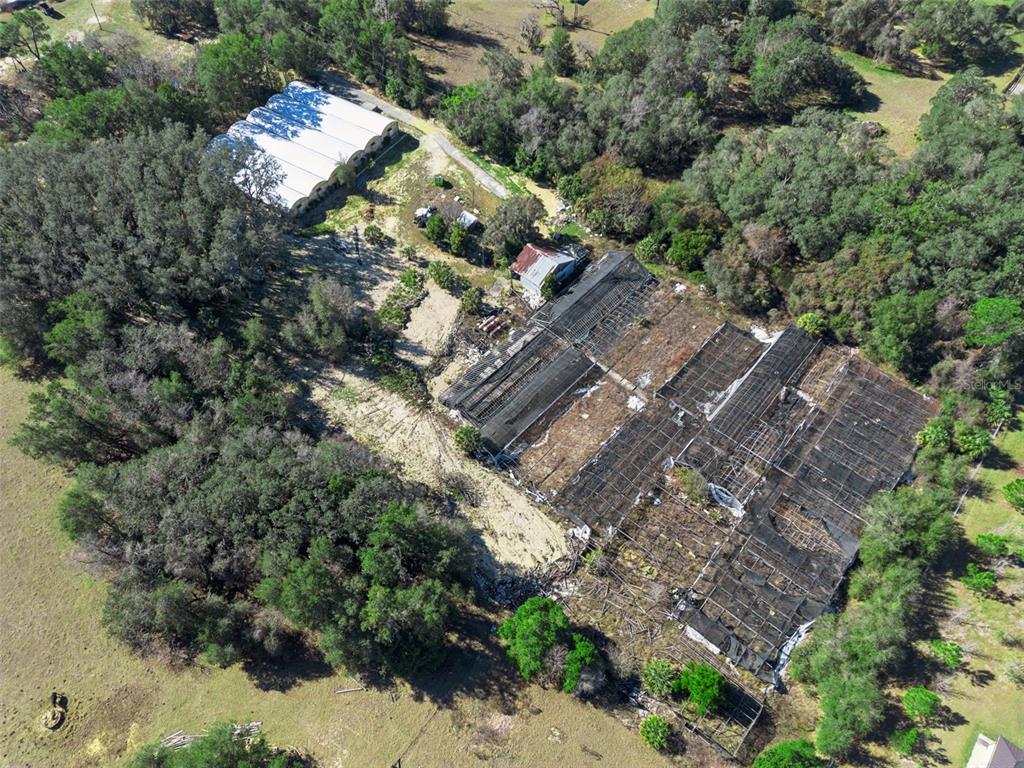 1909 Haas Road Apopka, FL 32712 - Photo 2 of 13 an aerial view of a house with a yard