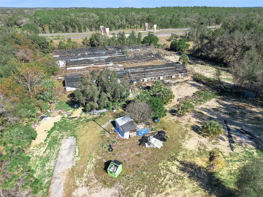 1909 Haas Road Apopka, FL 32712 - Photo 3 of 13 an aerial view of residential houses with outdoor space