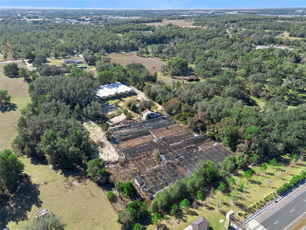 1909 Haas Road Apopka, FL 32712 - Photo 4 of 13 an aerial view of multiple house