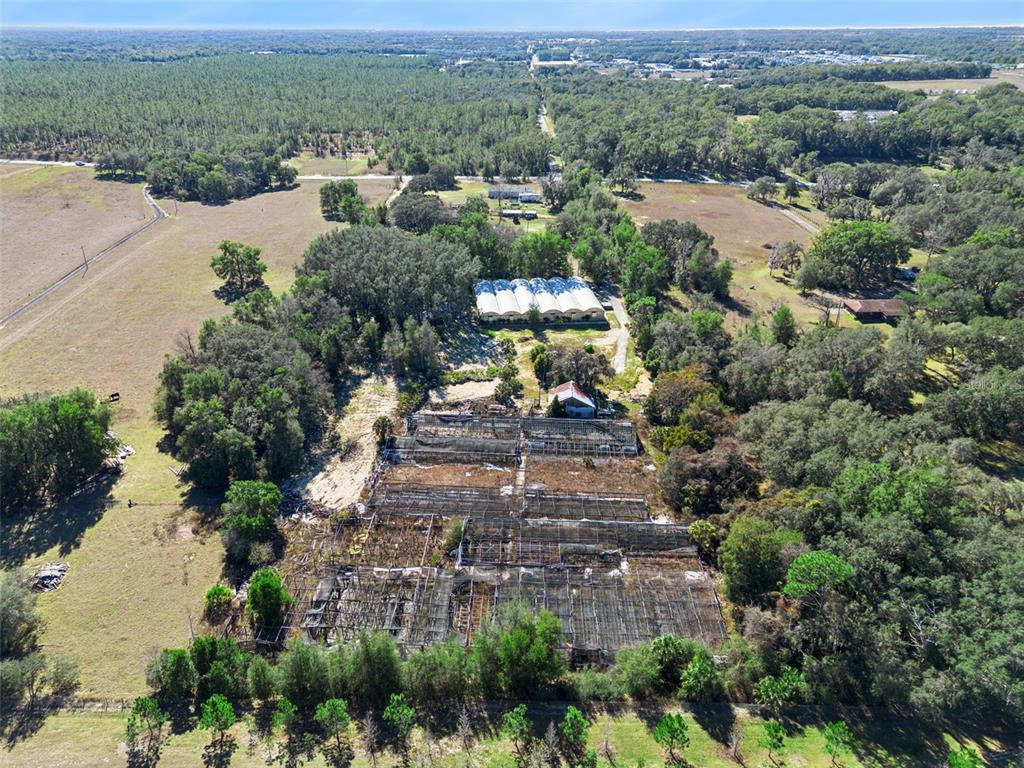 1909 Haas Road Apopka, FL 32712 - Photo 5 of 13 an aerial view of multiple house