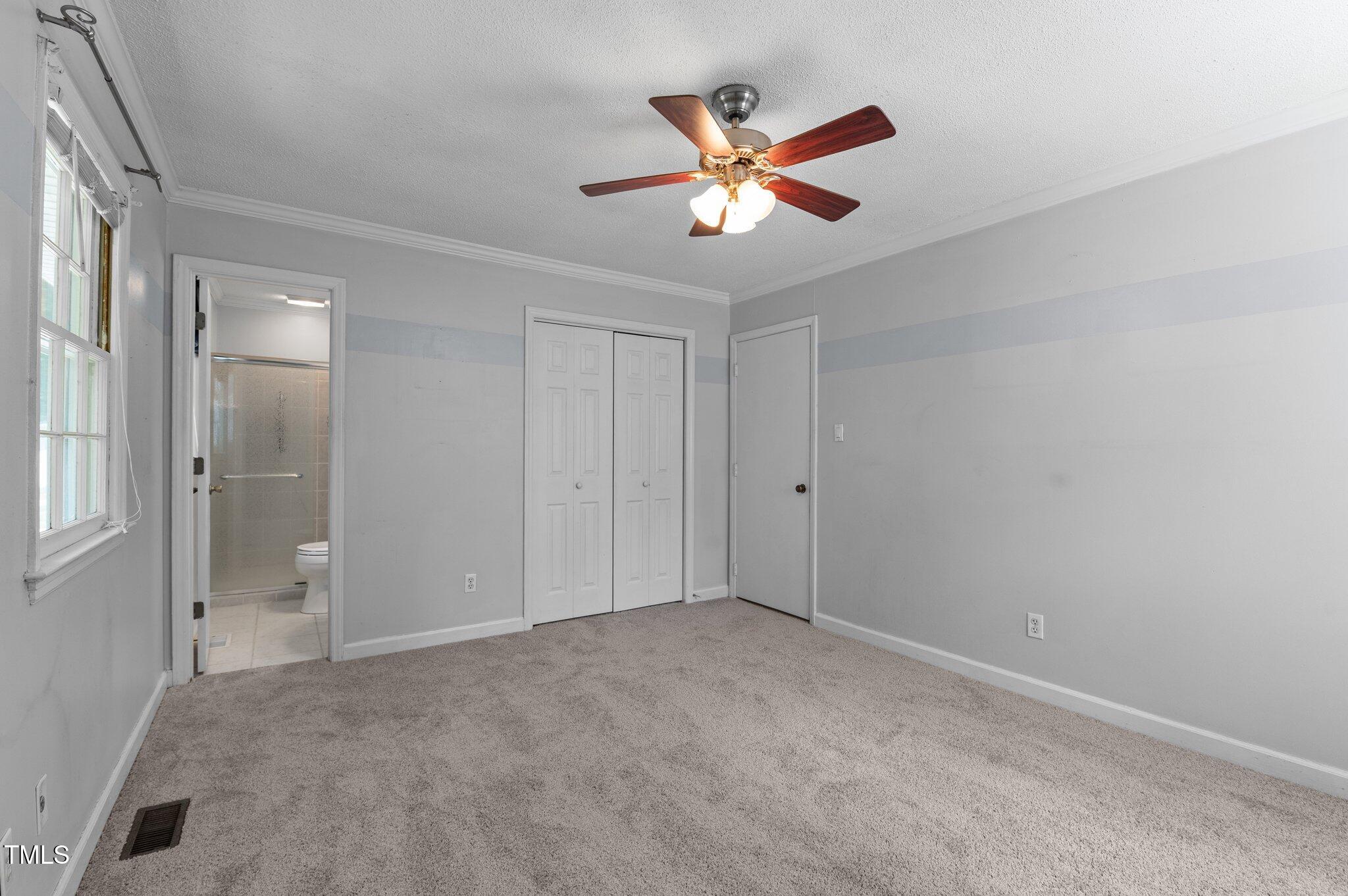 612 Harvest Lane Raleigh, NC 27606 - Photo 18 of 38 a view of empty room with window