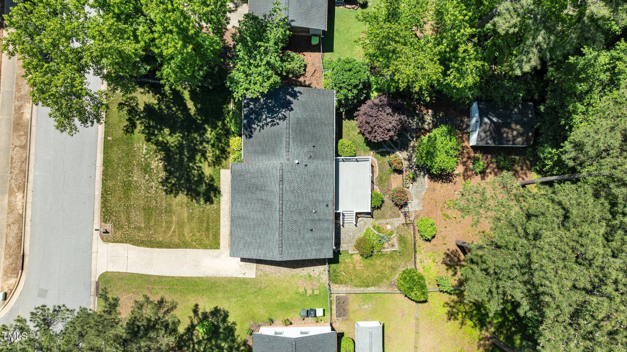 612 Harvest Lane Raleigh, NC 27606 - Photo 35 of 38 an aerial view of a house with a yard