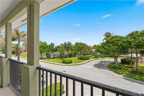a view of a porch and garden