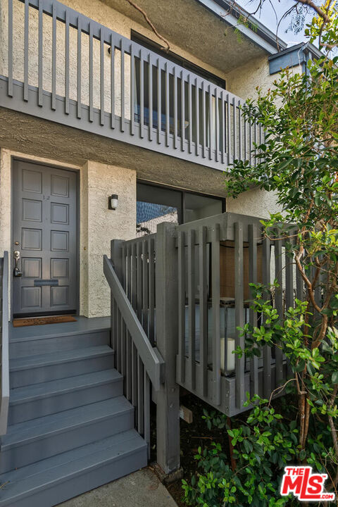 29239 Heathercliff Road, Unit 12 Malibu, CA 90265 - Photo 2 of 32 a view of a house with wooden floor