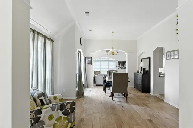 a view of a livingroom with furniture and a window