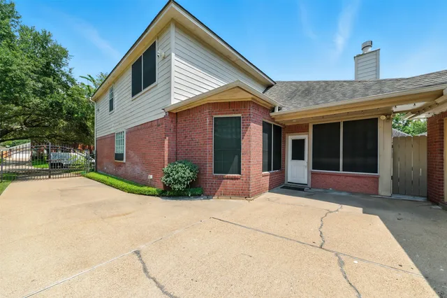 a house view with a garden space