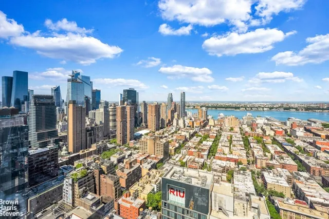 a view of a city with tall buildings