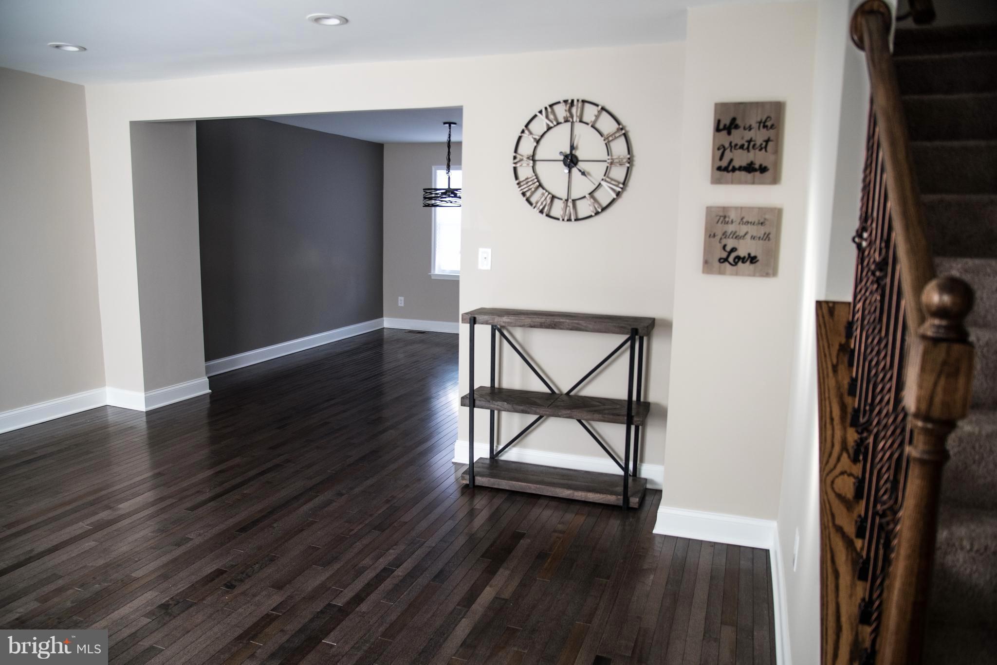 4130 Fairfax Road Baltimore, MD 21216 - Photo 1 of 30 a view of a hallway with wooden floor