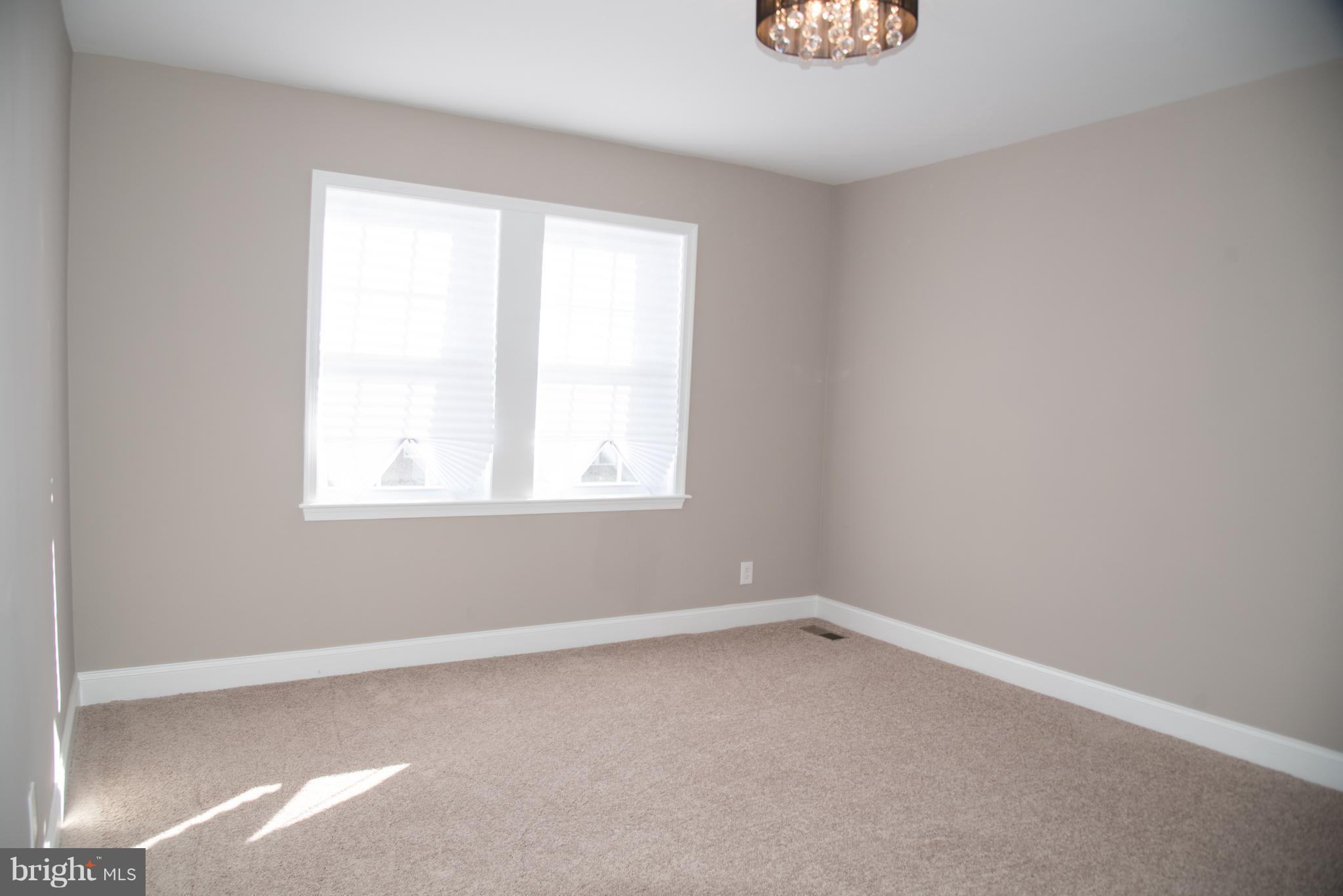 4130 Fairfax Road Baltimore, MD 21216 - Photo 17 of 30 an empty room with a window