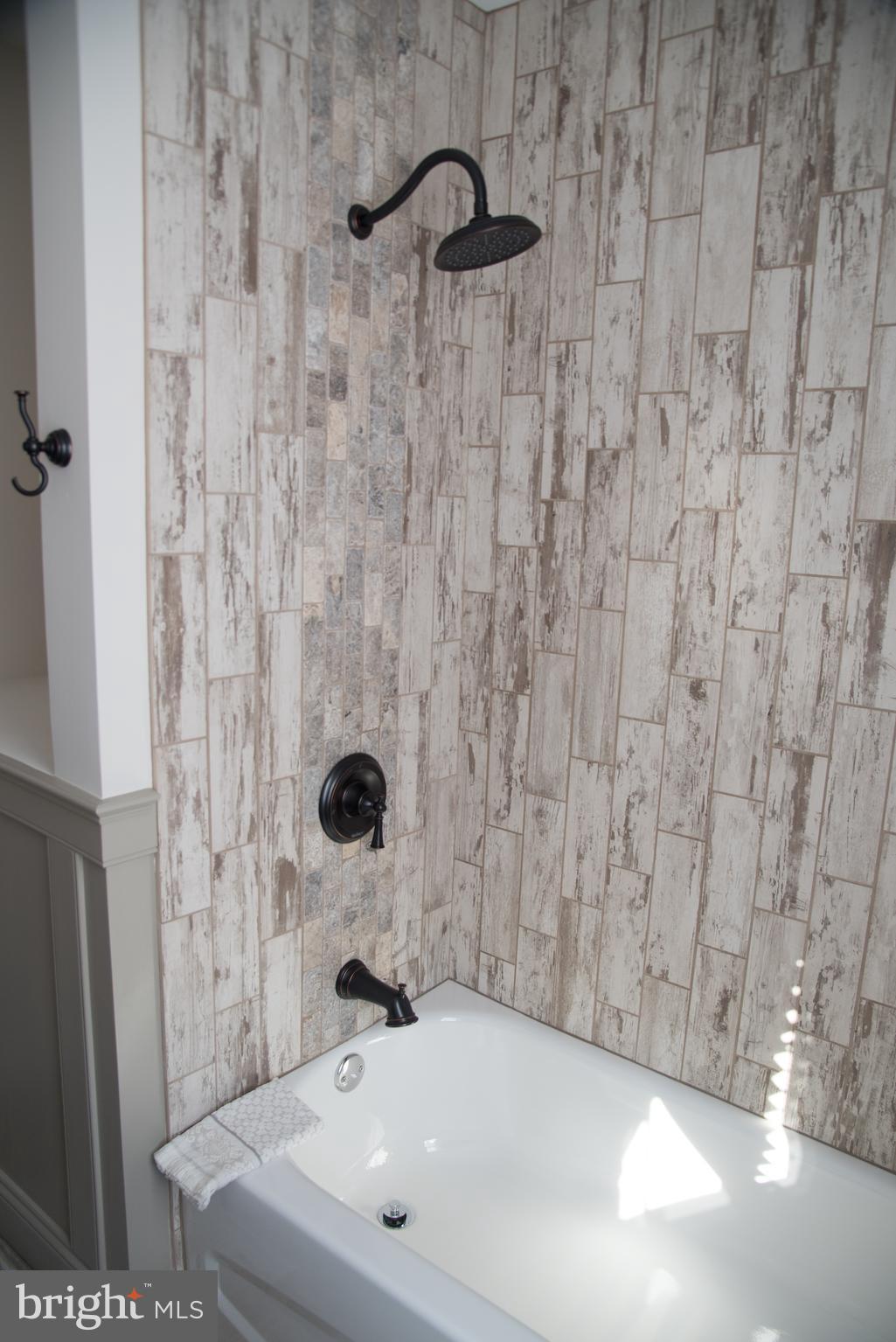 4130 Fairfax Road Baltimore, MD 21216 - Photo 20 of 30 a bathroom with a sink and a shower