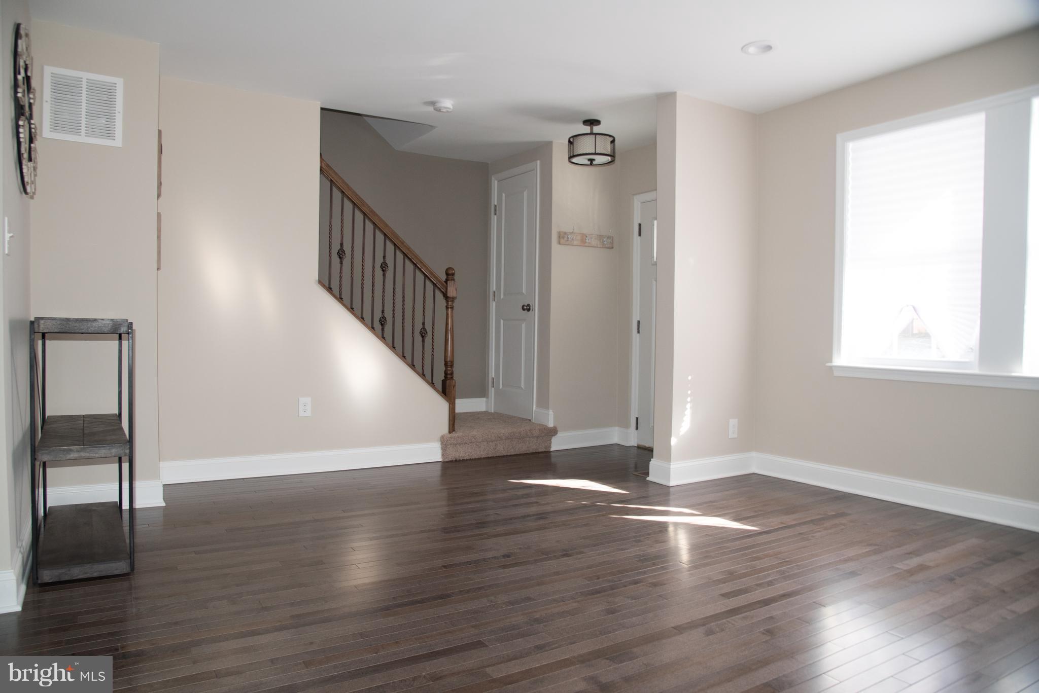 4130 Fairfax Road Baltimore, MD 21216 - Photo 3 of 30 a view of entryway with wooden floor