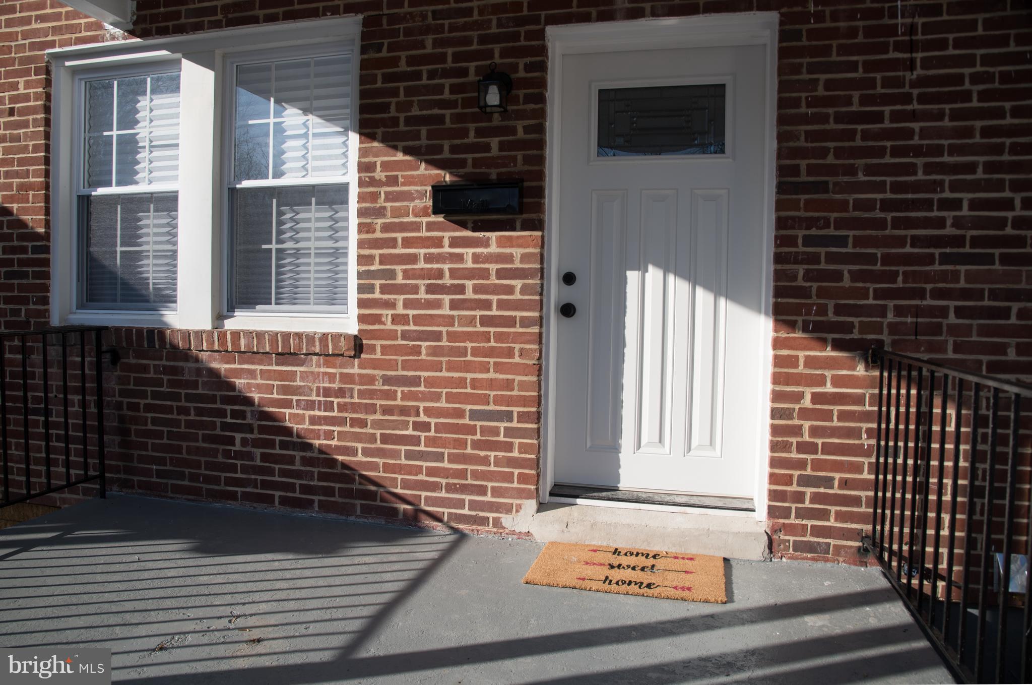 4130 Fairfax Road Baltimore, MD 21216 - Photo 28 of 30 a view of a brick house with wooden floor