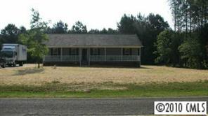 2118 Cedar Road York, SC 29745 - Photo 2 of 8 a front view of a house with a yard