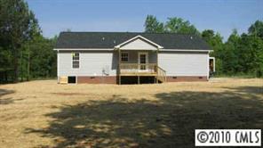 2118 Cedar Road York, SC 29745 - Photo 6 of 8 a front view of a house with a yard
