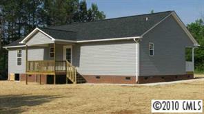 2118 Cedar Road York, SC 29745 - Photo 7 of 8 a front view of a house with a yard
