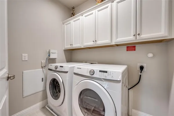 a view of a kitchen with a sink and a window