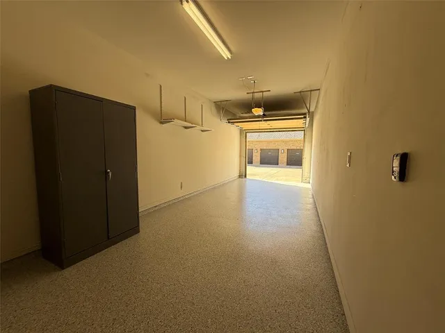 a building view with swimming pool and outdoor seating