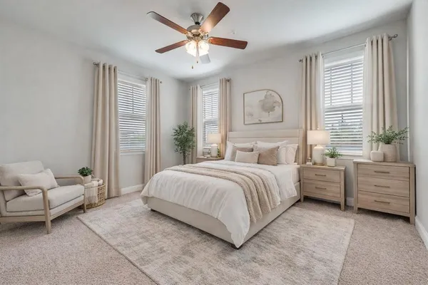 a spacious bedroom with a bed and a window
