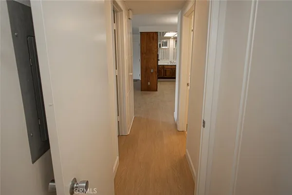 a view of a bathroom from a hallway