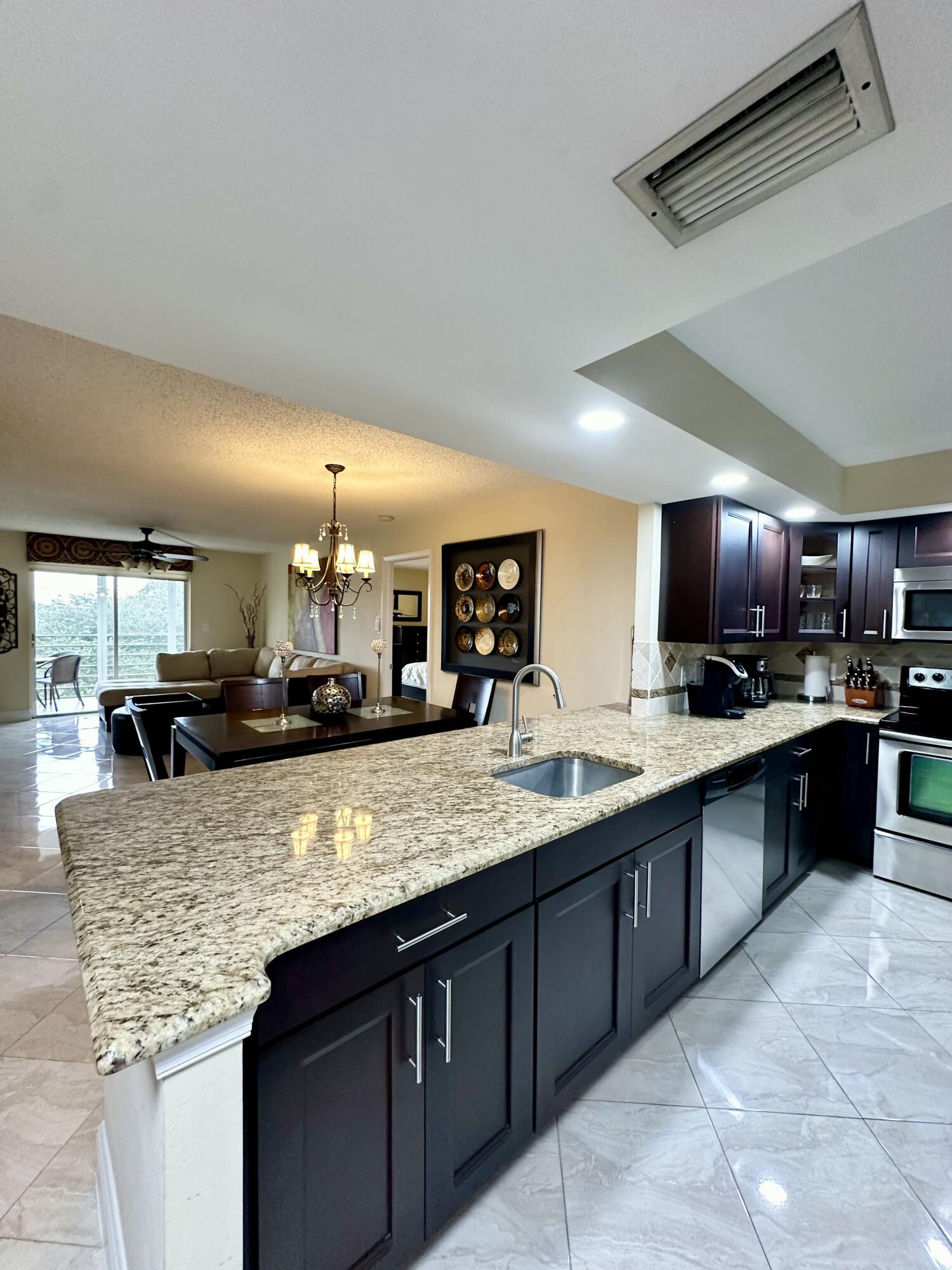 299 Northwest 52nd Terrace, Unit 422 Boca Raton, FL 33487 - Photo 2 of 39 IMG_7932