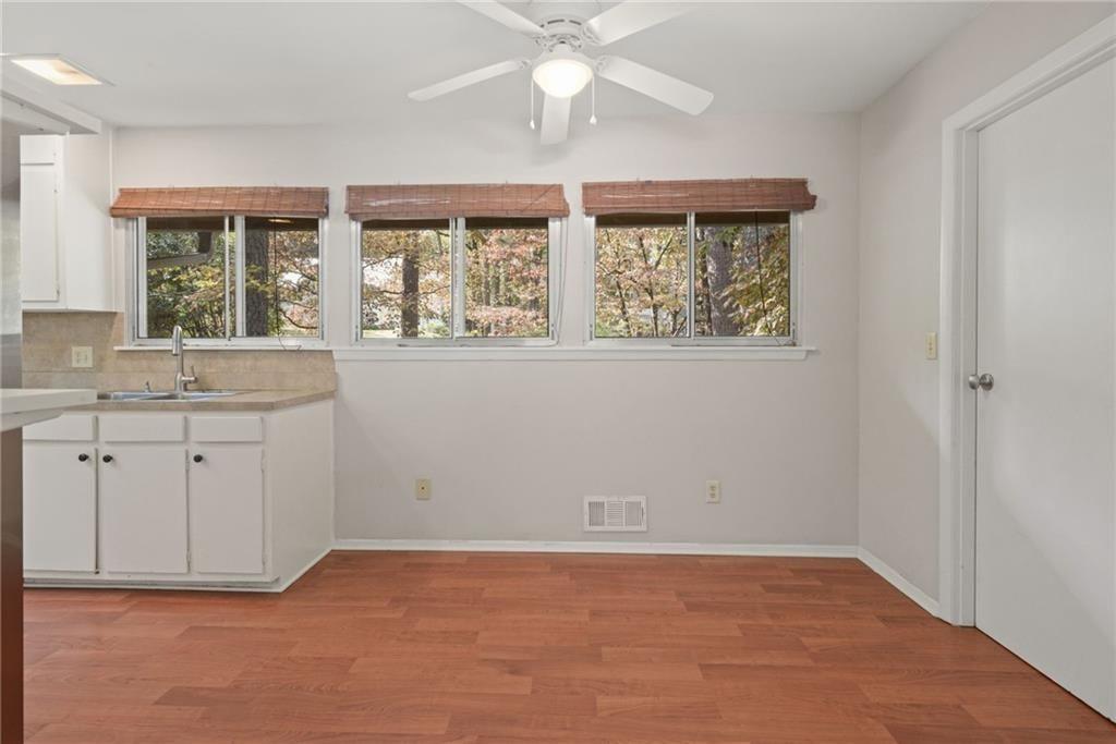 705 Edgewater Trail Sandy Springs, GA 30328 - Photo 18 of 36 an empty room with windows