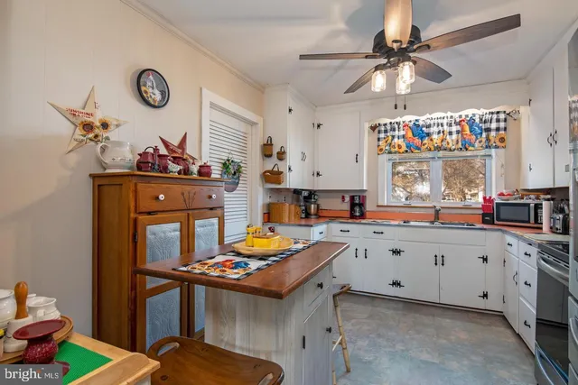 a very nice looking dining room with a table and chairs