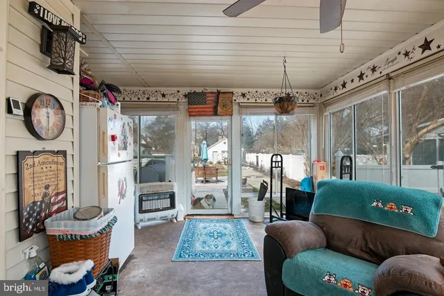 a living room filled with furniture