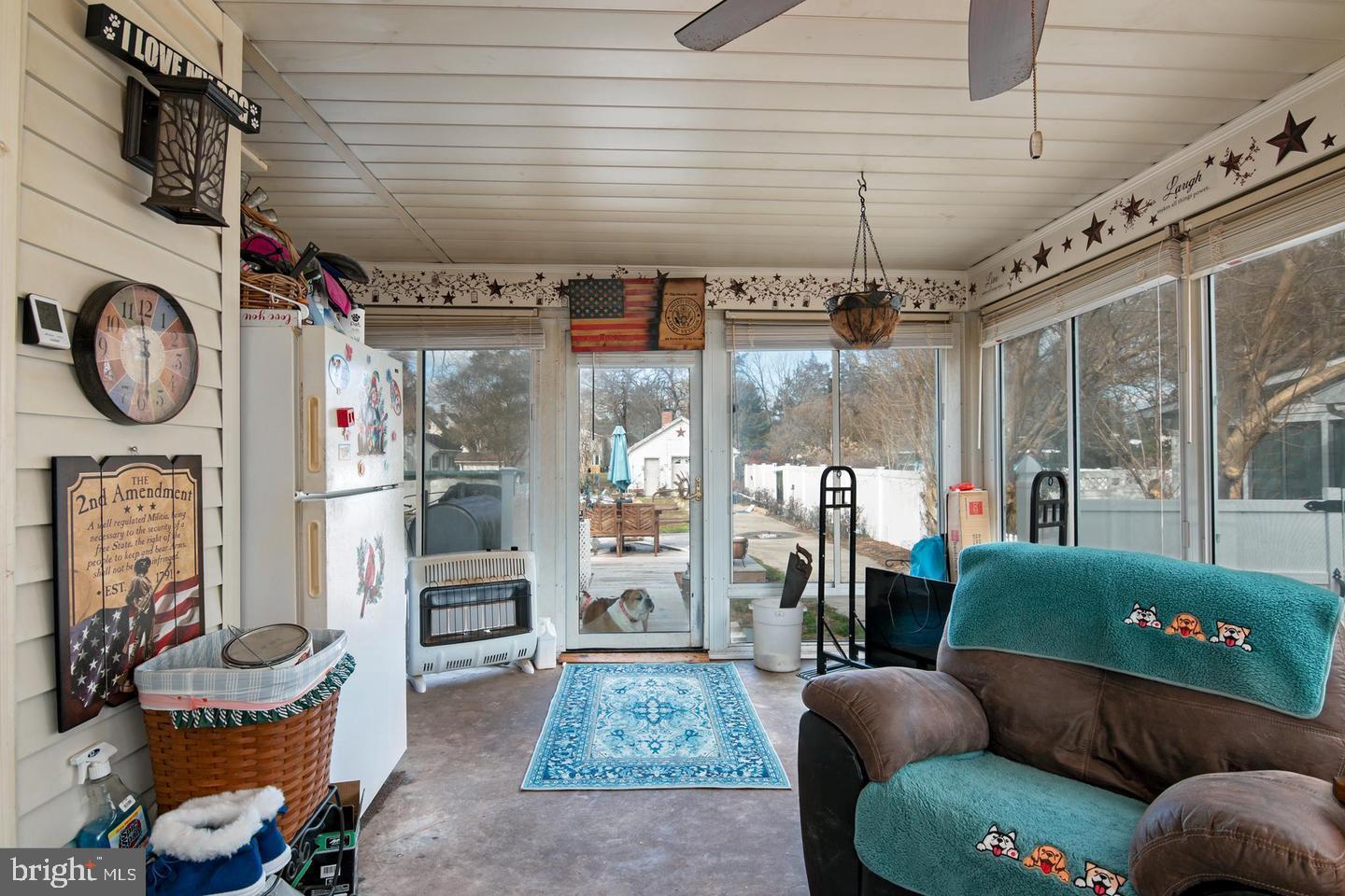 109 Mill Street Cambridge, MD 21613 - Photo 8 of 31 Heated Sunroom