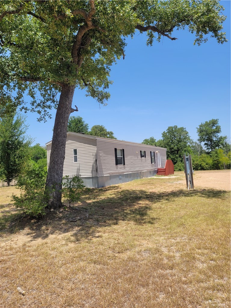 147 Red Bud Trail North Elgin, TX 78621 - Photo 1 of 1 2 bedroom 2 bath mobile home on 5 acres,