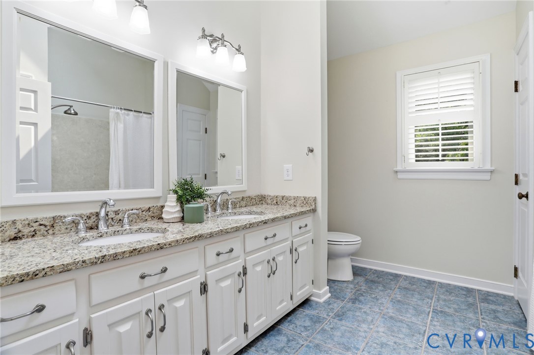 2904 Old Gun Road West Midlothian, VA 23113 - Photo 33 of 59 Dual vanity with an extended countertop, white cab