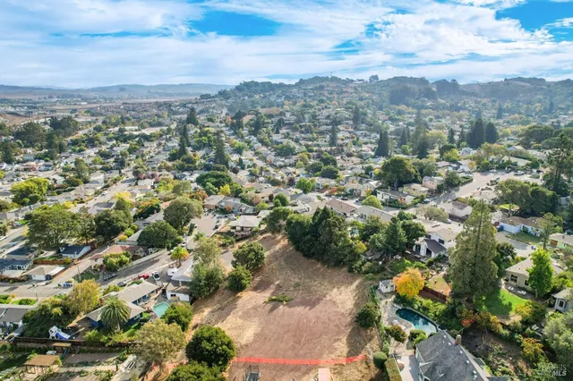 an aerial view of residential house with outdoor space