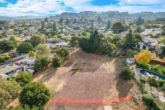an aerial view of residential house with parking space