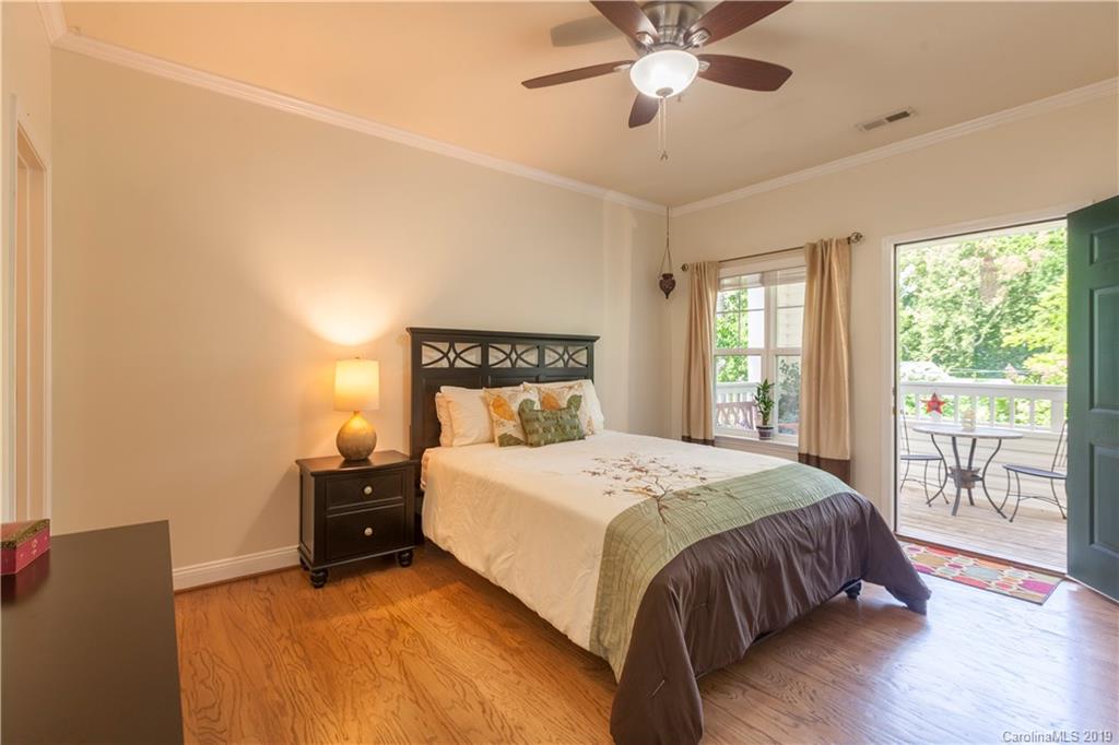 5730 Closeburn Road, Unit M Charlotte, NC 28210 - Photo 11 of 21 a bedroom with a bed and window